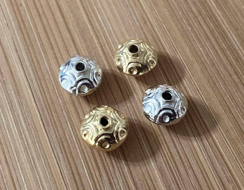 REDUCED Bali Embossed Saucer Beads, 6mm x 8mm (1.3mm hole) - sold individually