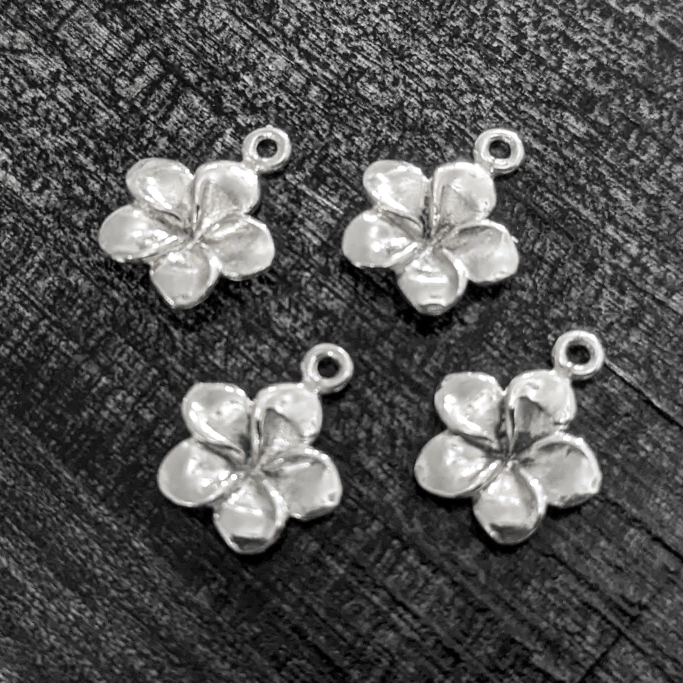 Bali Plumeria Flower Charms, 9mm wide x 10.7mm high (including loop) - sold individually