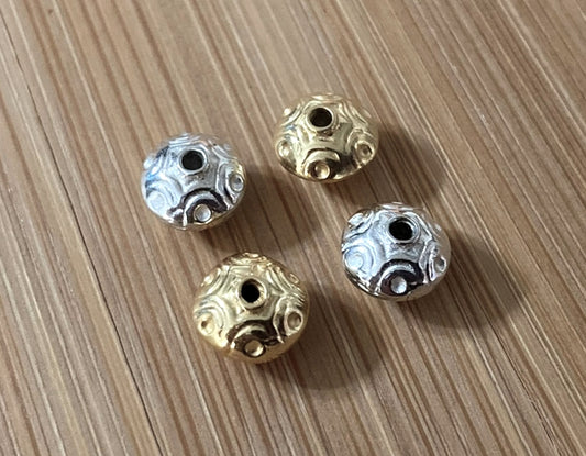 CLEARANCE Bali Embossed Saucer Beads, 6mm x 8mm (1.3mm hole) - sold individually