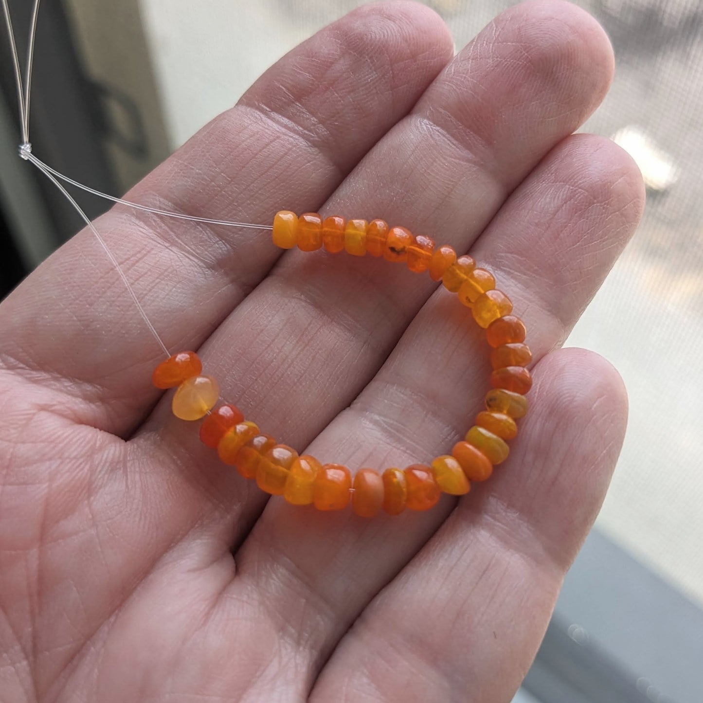 Orange Ethiopian Welo Opal Smooth Rondelles, 3 inch strand, 3.8-5mm diameter