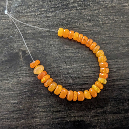 Orange Ethiopian Welo Opal Smooth Rondelles, 3 inch strand, 3.8-5mm diameter